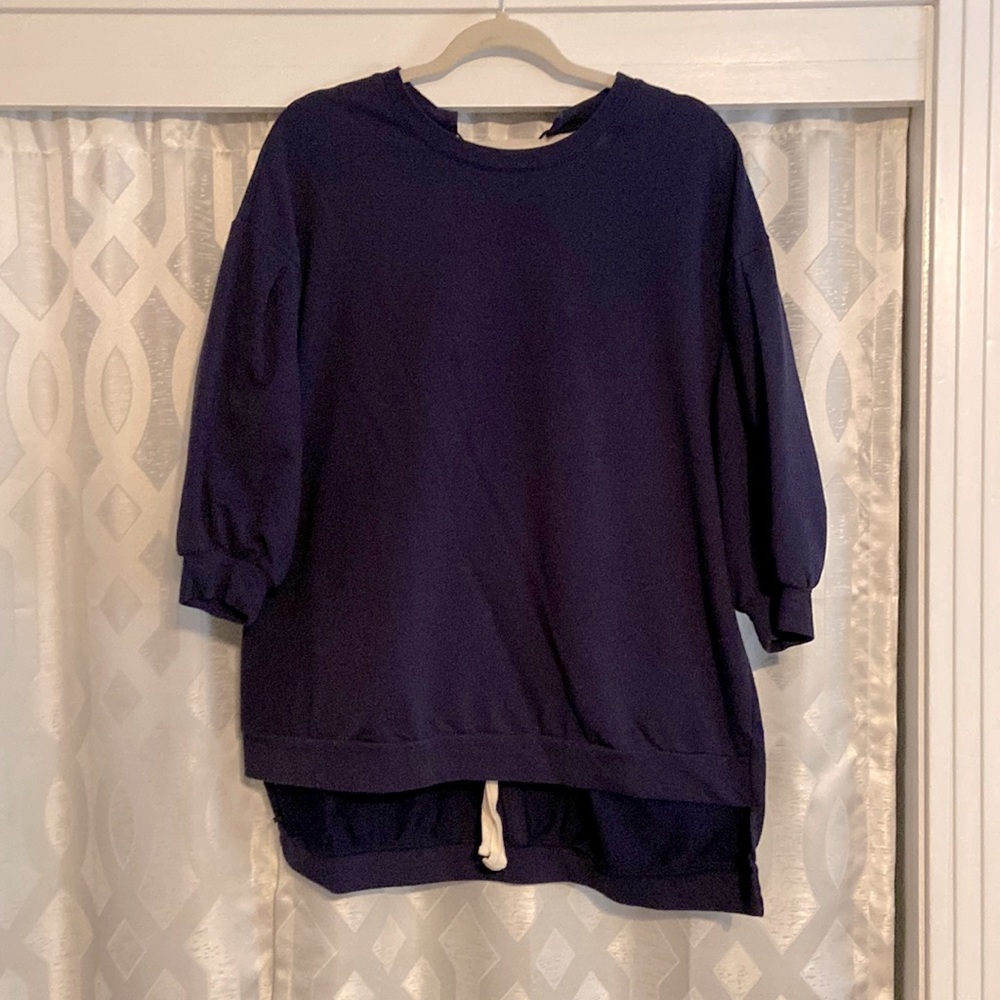 Navy blue sweater.